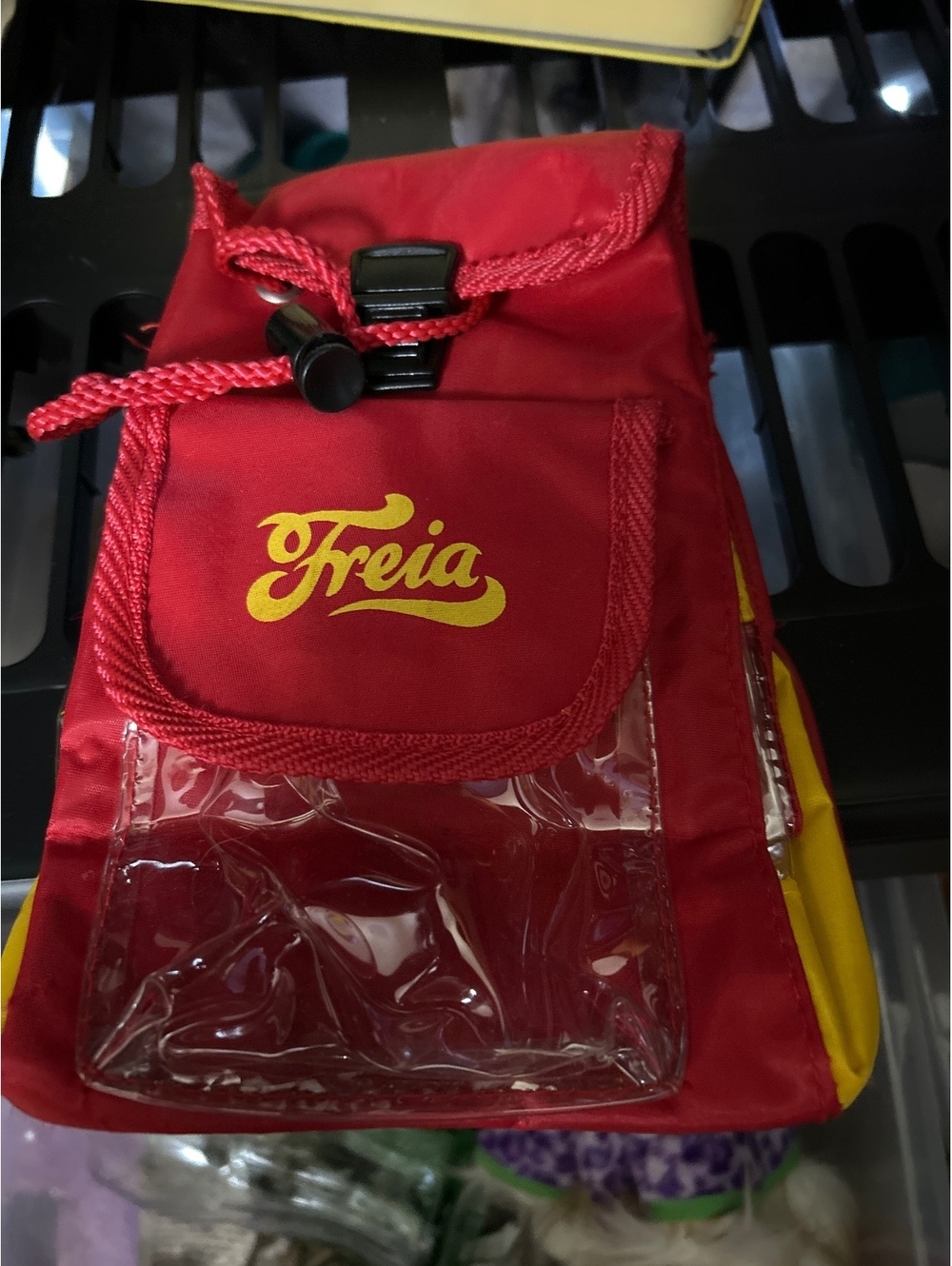 Freia Red and Yellow Small Drawstring Backpack with Clear Front Pocket